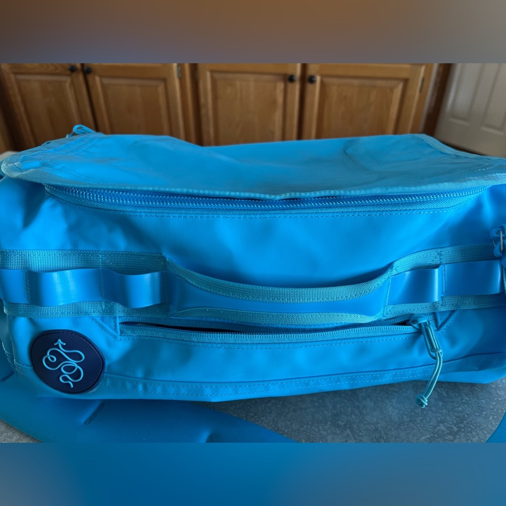 Gently used Go Bag Mini 32L Magic City Pool Blue Bag.
